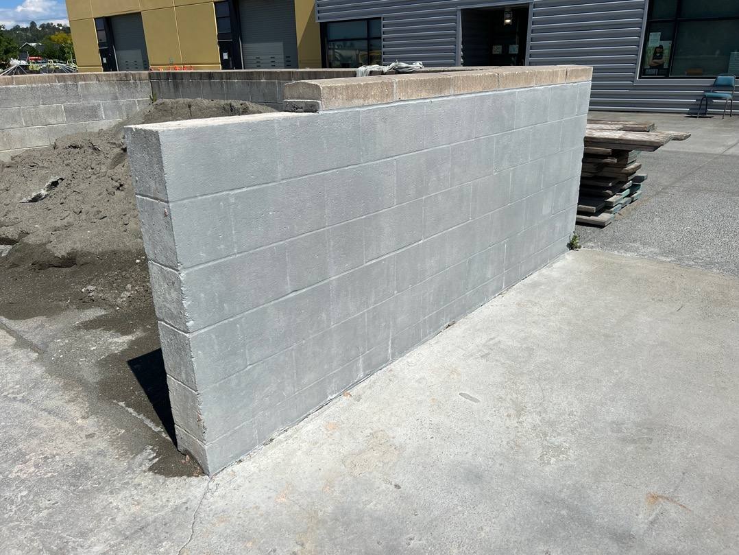 CeramycGuard ceramic concrete coating on a CMU block wall