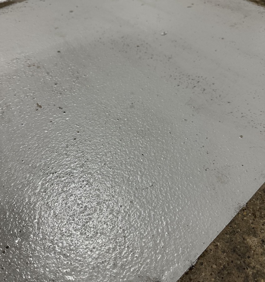 Fortress XD industrial floor coating on a concrete slab edge