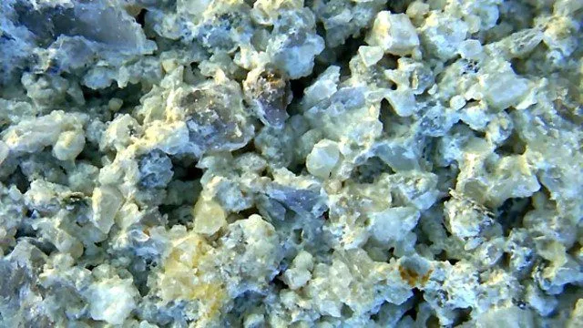Untreated porous concrete under magnification, open pore network